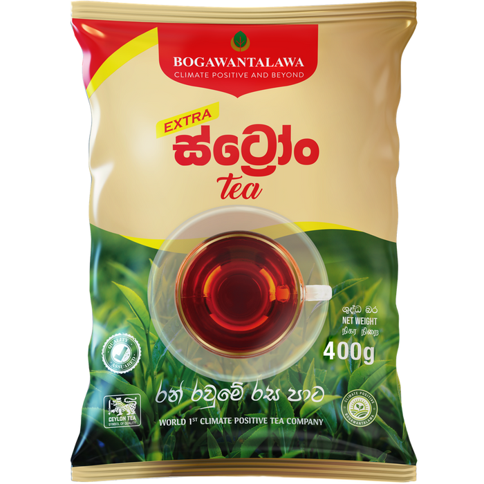 A 400g package of Bogawantalawa Extra Tea, featuring a beige and green design with a central illustration of a glass cup filled with dark red tea.