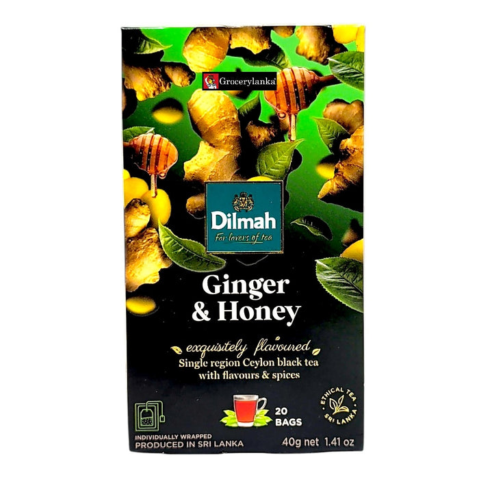 Dilmah Ginger & Honey tea packaging with ginger and honeycomb design on a green background